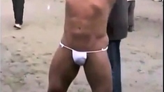 Muscled Asian Stud Bares Almost All At The Beach