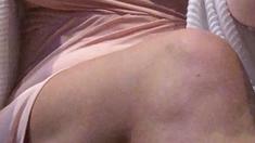 Busty curly brunette with big boobs fucks on couch