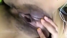 Malaysian Babe in Hijab Masturbates