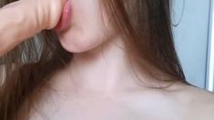 Hot Brunette Sucks A Dildo