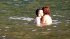 Amateur couple playing at beach - Madeira Island - Seixal