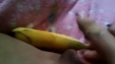 Arab slut masturbate with a big banana